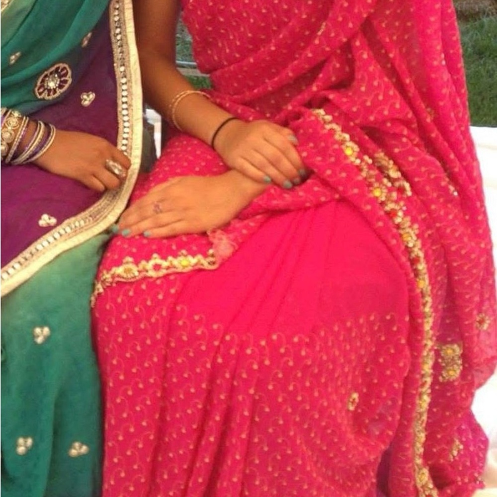 Elegant Pink and Gold Saree with Subtle Pattern